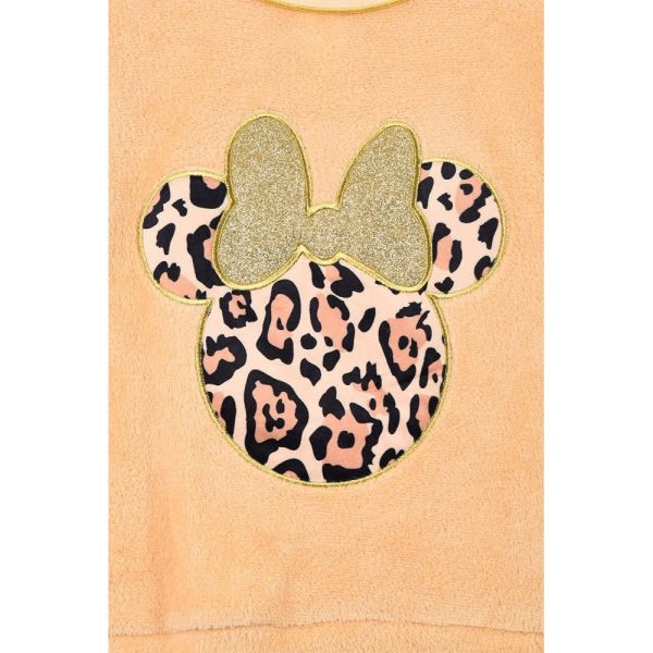 Diseño de Minnie Mouse con estampado de leopardo y lazo dorado.