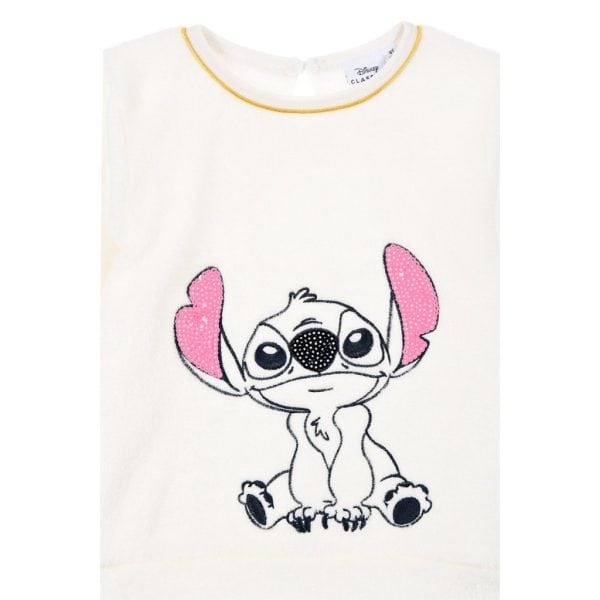 Camiseta blanca con dibujo de un perro con orejas rosas y expresión triste.