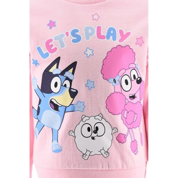 Ropa infantil con personajes de dibujos animados y texto Let's Play en rosa.
