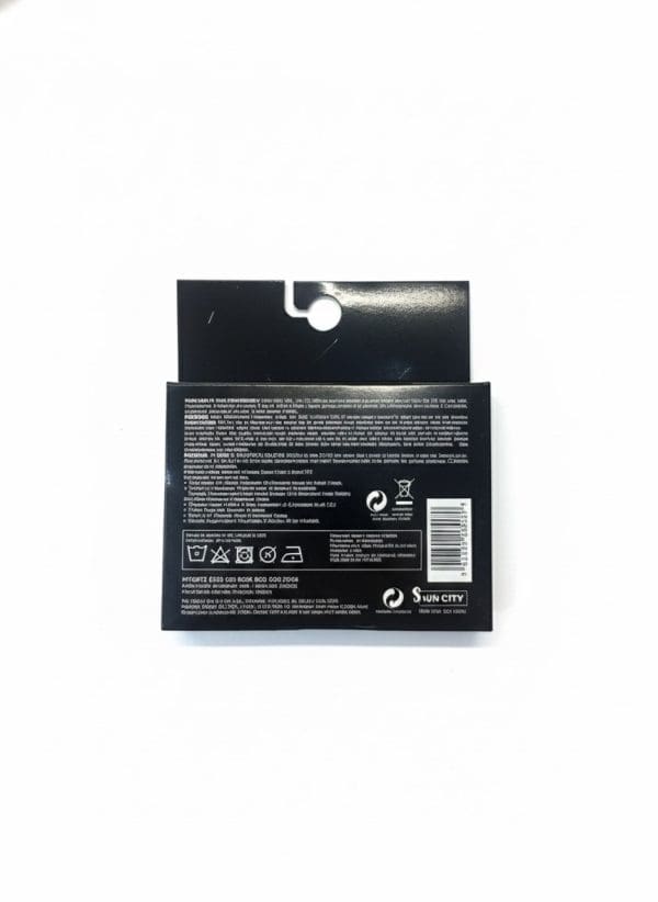 Etiqueta de producto de ropa de La Giralda en color negro con instrucciones.