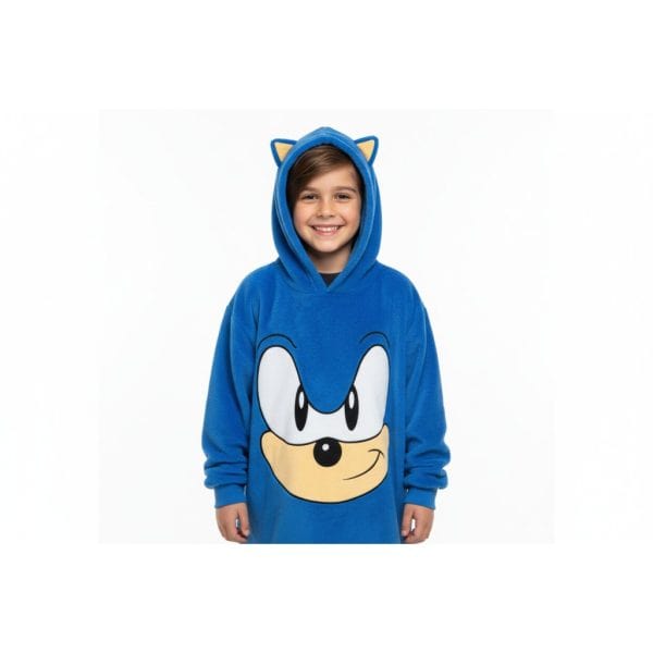 Niña con disfraz de Sonic la mascota de videojuegos en color azul.