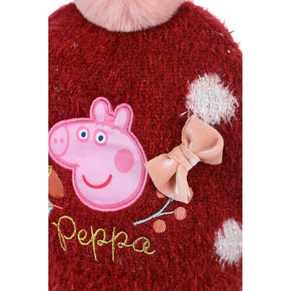 Ropa infantil de Navidad con diseño de Peppa Pig y lazo rosa.