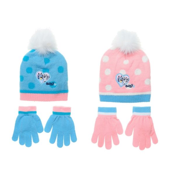 Gorros y guantes infantiles de la marca Blugy en colores rosa y azul con pompones.