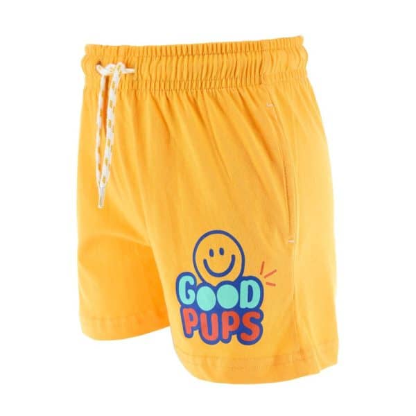 Pantalones cortos amarillos con logo de 'Good Pups' y sonrisa en la parte frontal.