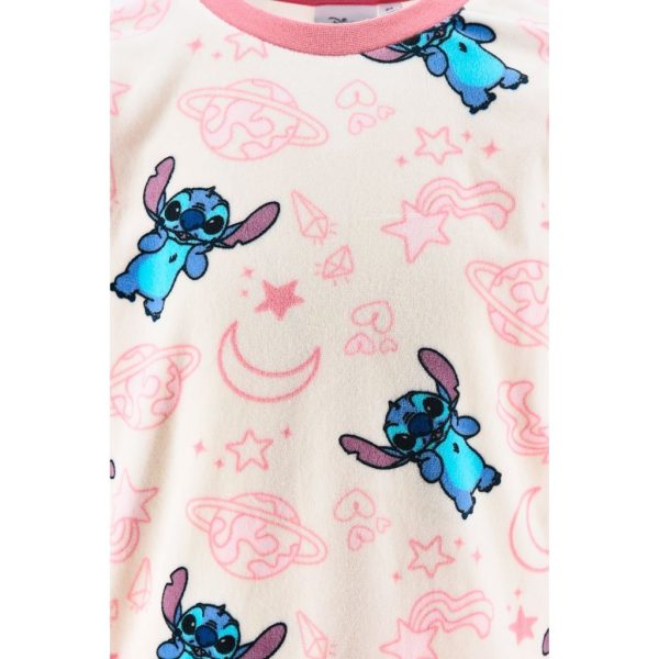Ropa infantil de la marca La Giralda con estampado de personajes de Disney y motivos espaciales.