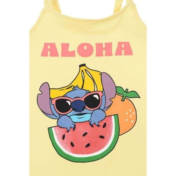 Vestido amarillo con diseño de personajes tropicales y la palabra ALOHA.