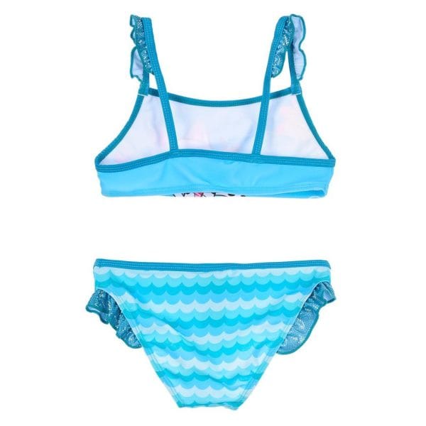 Bañador de niña en tonos azules con diseño de olas y detalles de encaje.