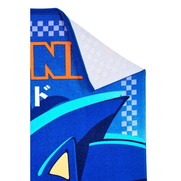Toalla de playa con diseño azul y detalles en naranja y blanco de Ropa La Giralda.