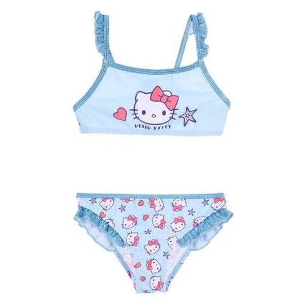 Conjunto de ropa infantil con Hello Kitty en azul y rosa.